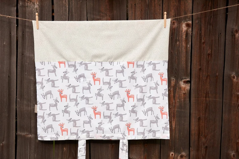 Bezug für Wickeltischauflage kleine Rehkitze grau orange auf Weiß