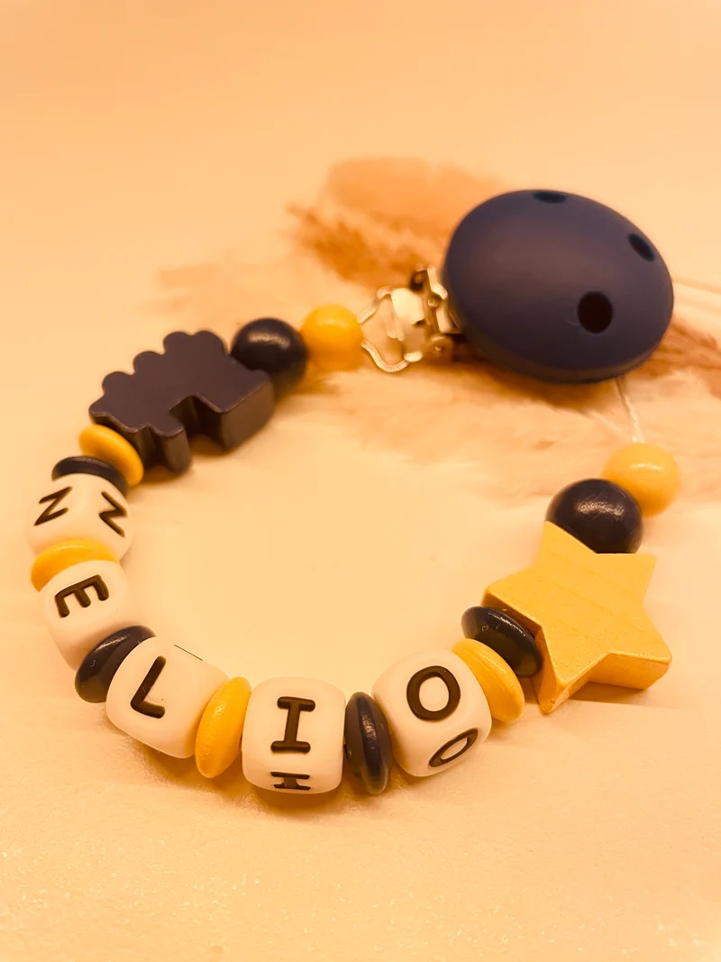 Schnullerkette blau gelb Lokomotive Stern