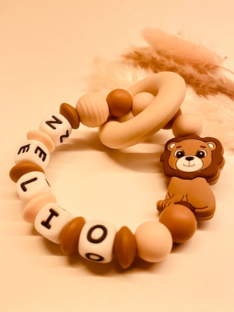 Schnullerkette Kinderwagenkette Greifring Löwe braun/beige
