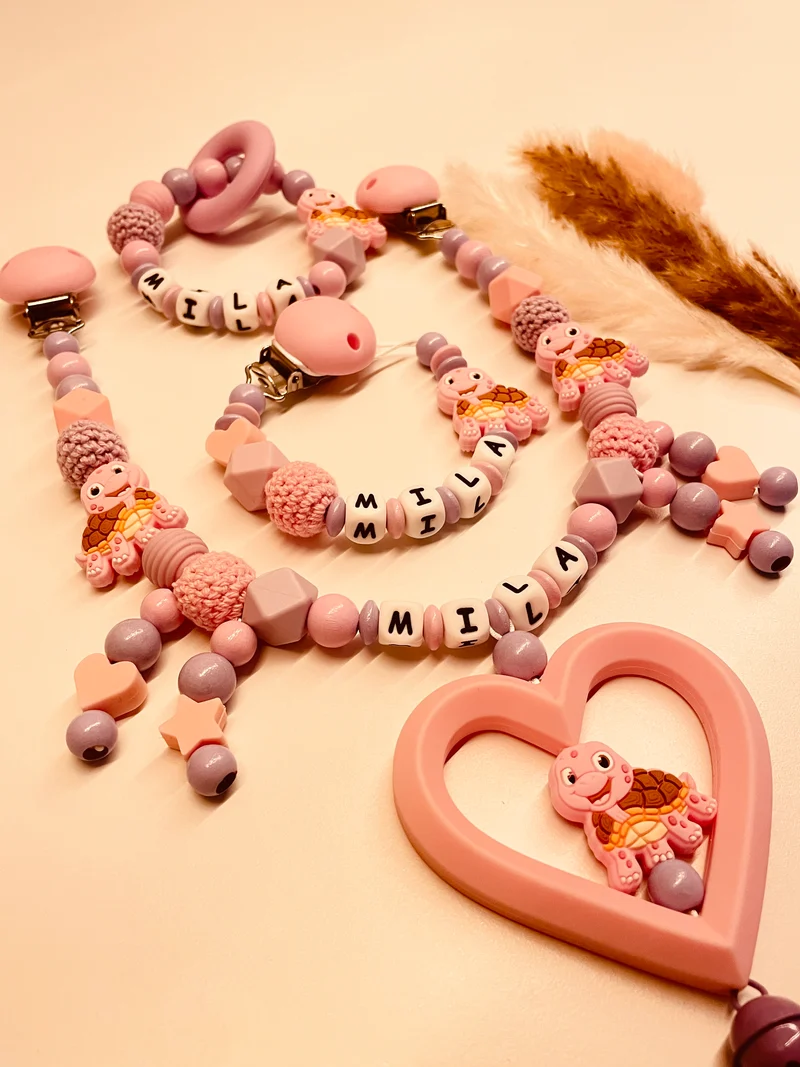 Schnullerkette, Kinderwagenkette, Greifring Schildkröte rosa flieder