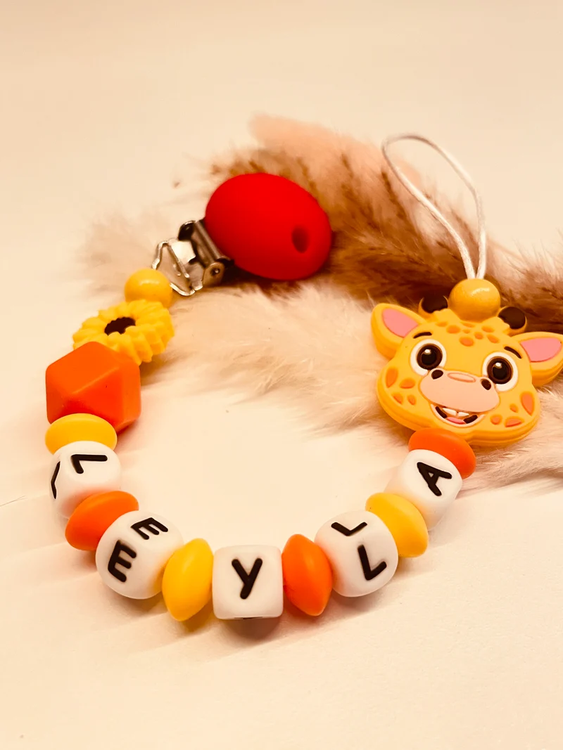 Schnullerkette Giraffe orange gelb rot 12,90€, statt 17,90€
