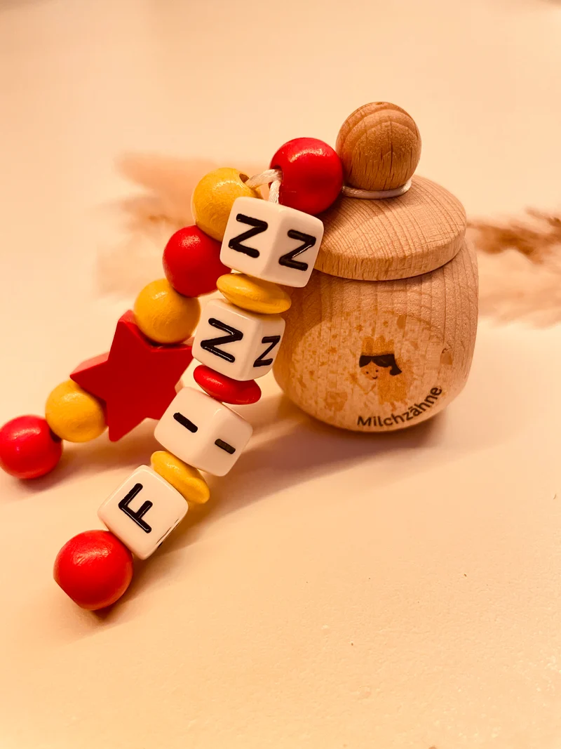Milchzahndose Stern rot/gelb personalisiert