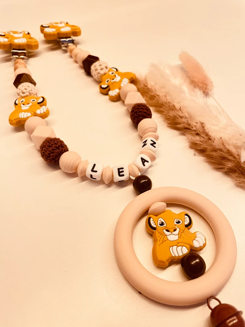 Schnullerkette, Kinderwagenkette, Greifring Löwe beige braun