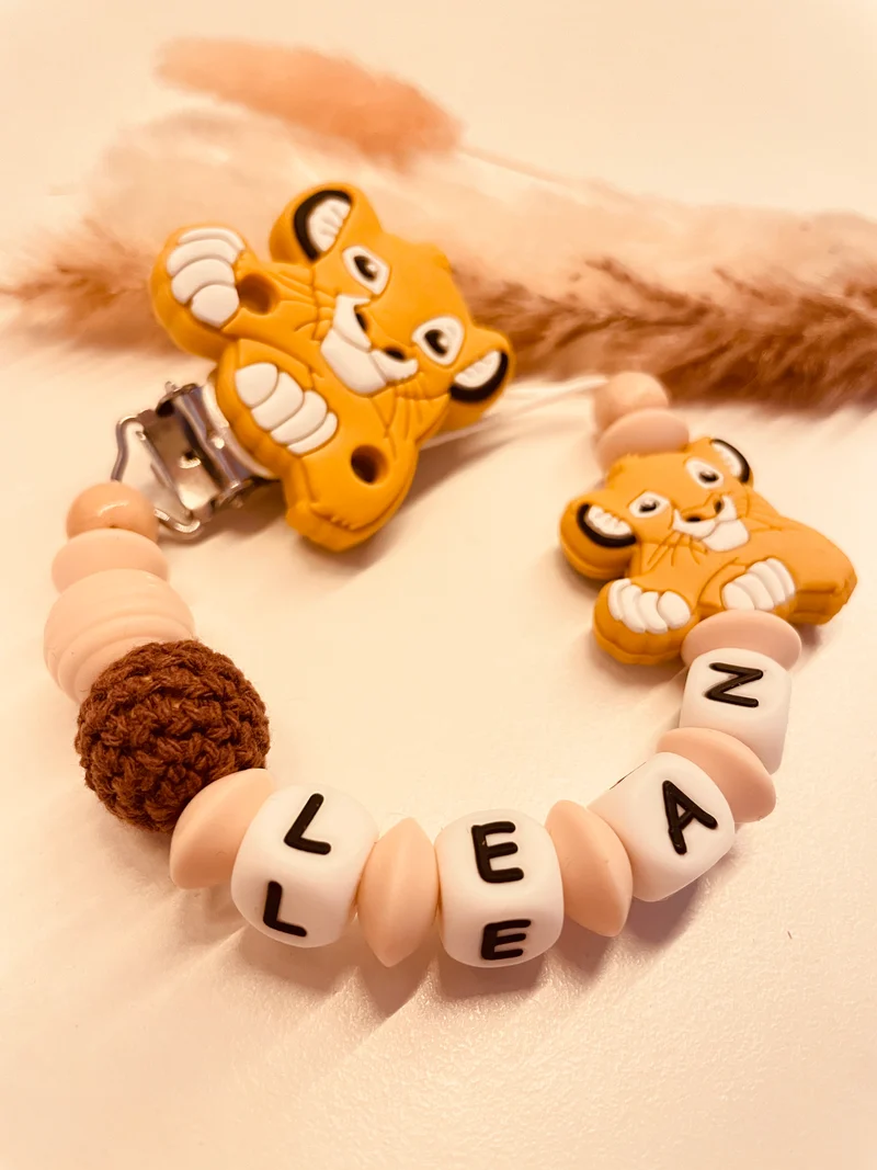 Schnullerkette, Kinderwagenkette, Greifring Löwe beige braun