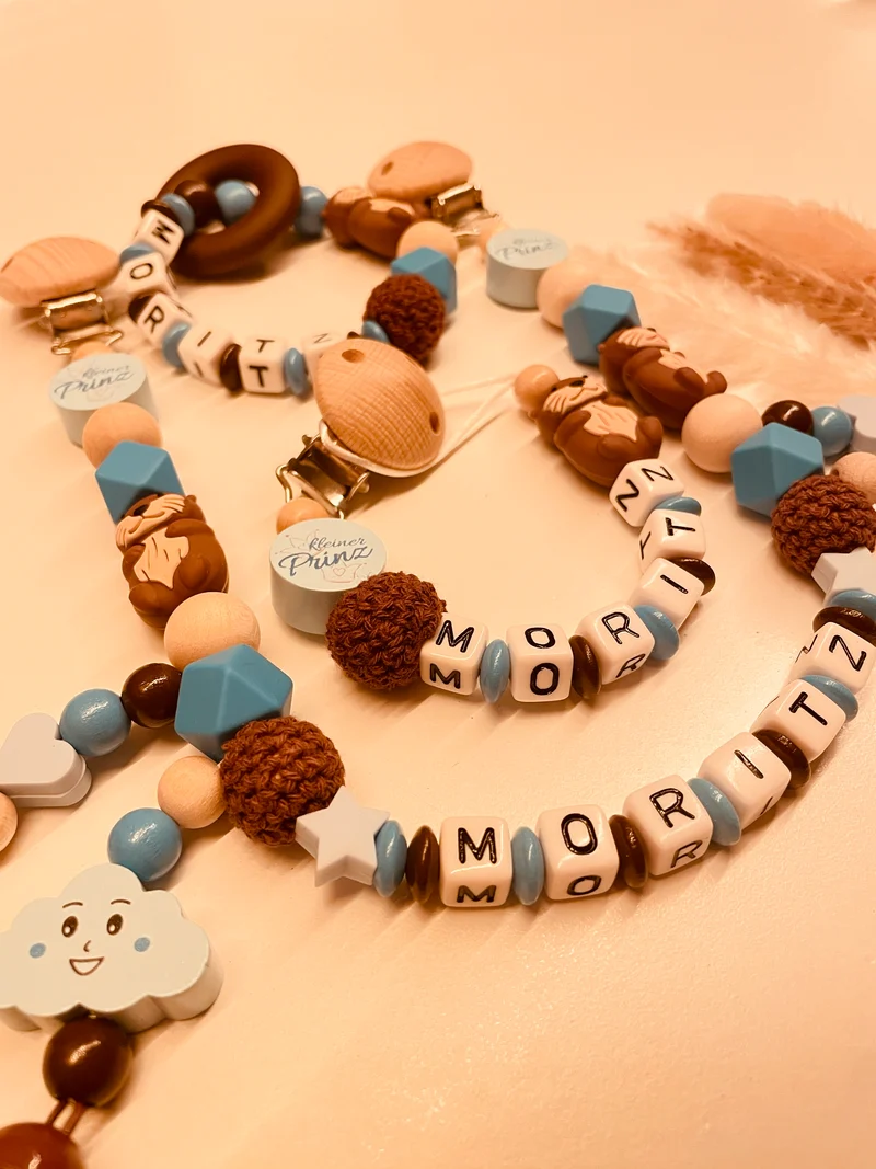Schnullerkette, Kinderwagenkette Otter blau braun