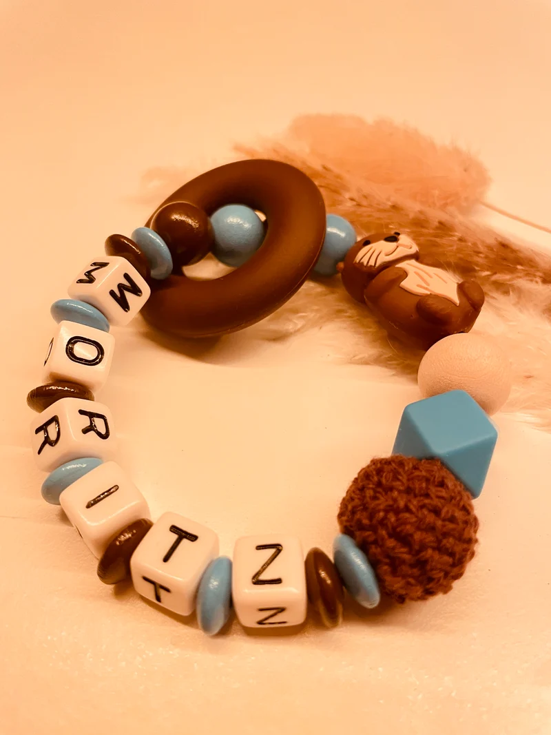 Schnullerkette, Kinderwagenkette Otter blau braun