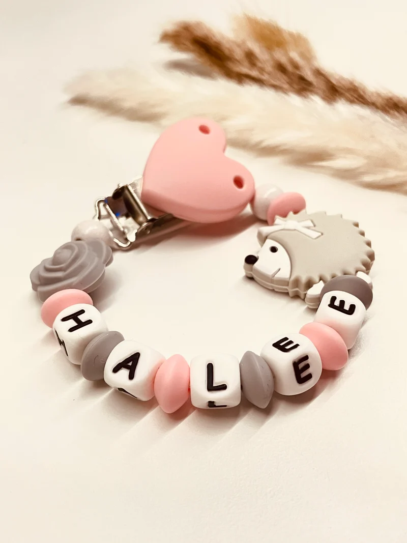 Schnullerkette Igel mit Rose candy rosa-grau