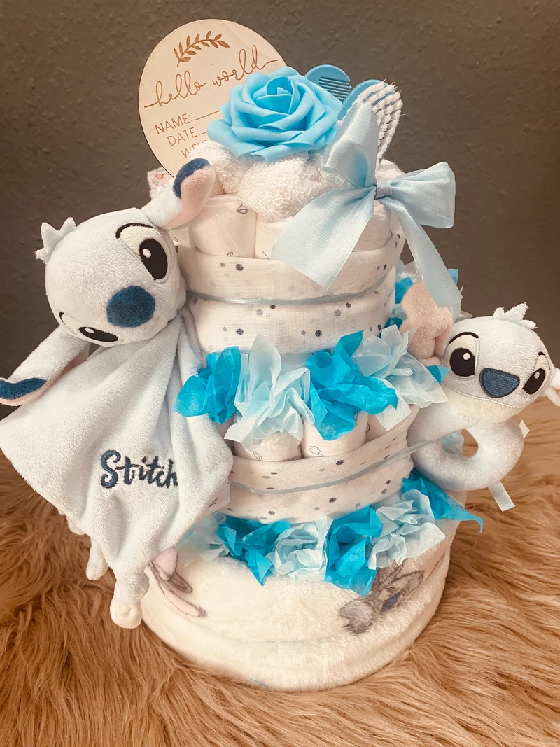 Windeltorte Monster blau mit Schnuffeltuch und Stoffrassel
