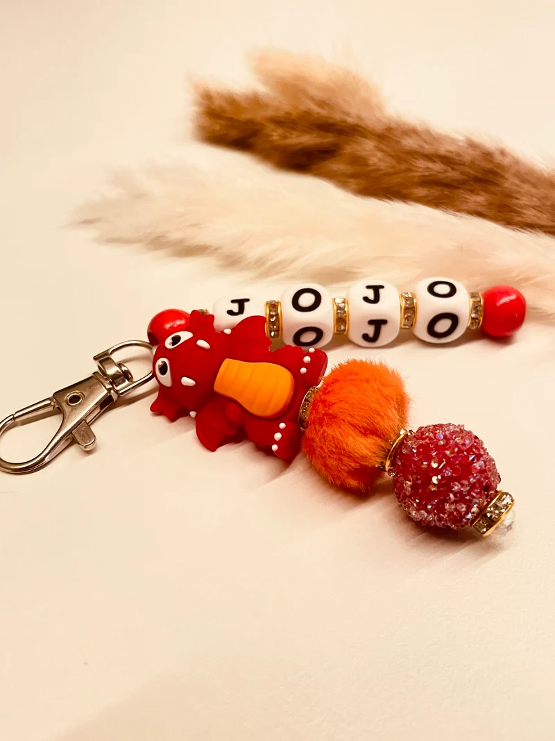 Schlüsselanhänger Drache rot orange