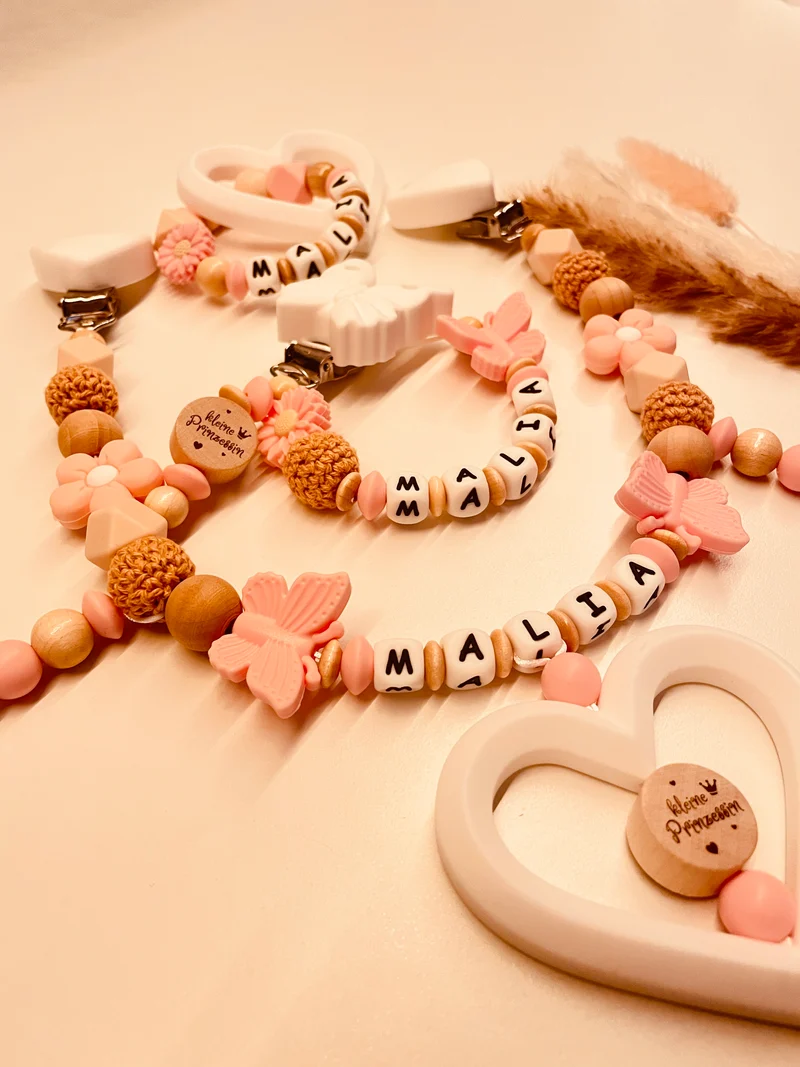 Schnullerkette, Kinderwagenkette, Greifring Schmetterling kleine Prinzessin rosa natur