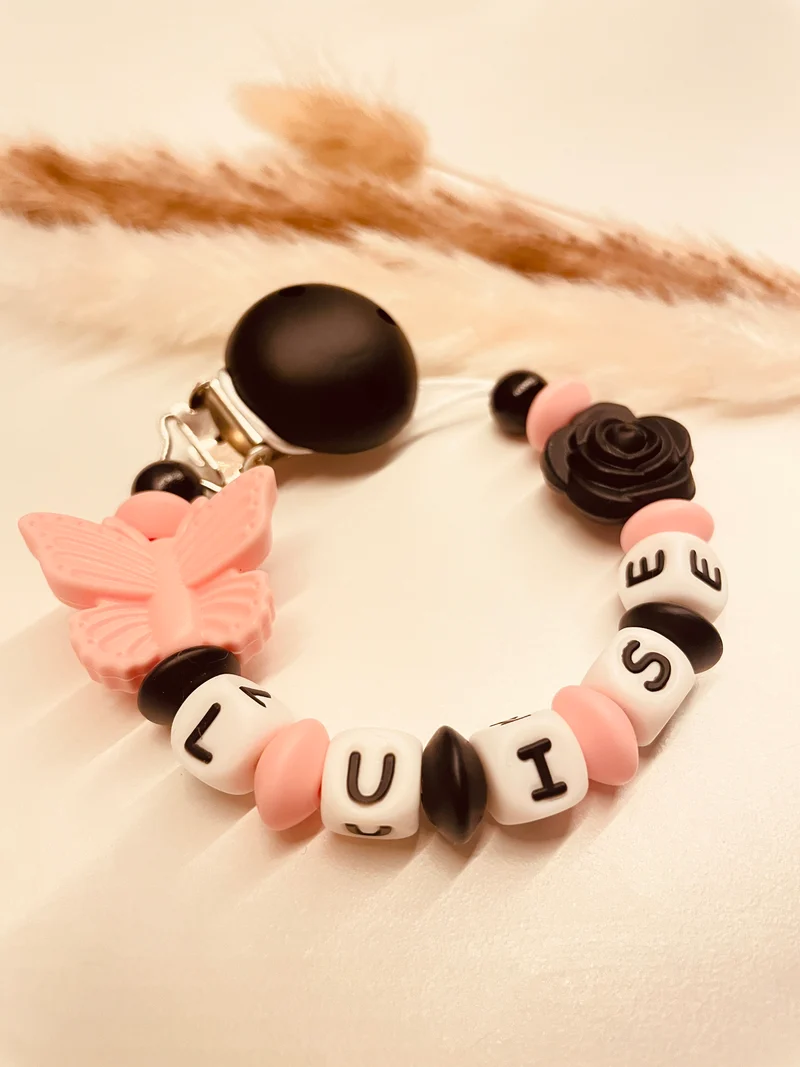Schnullerkette Schmetterling mit Rose schwarz rosa