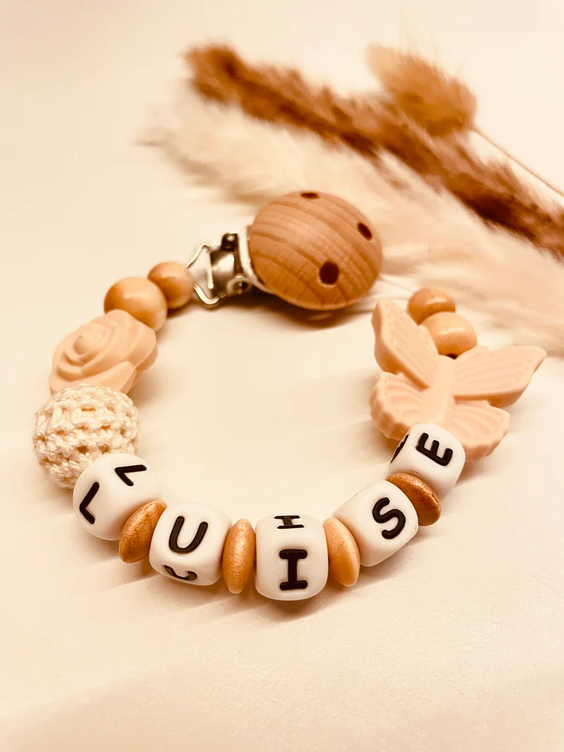Schnullerkette Schmetterling beige natur 12,90€, statt 17,90€