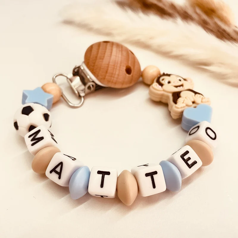 Schnullerkette Affe mit Fußball blau-beige