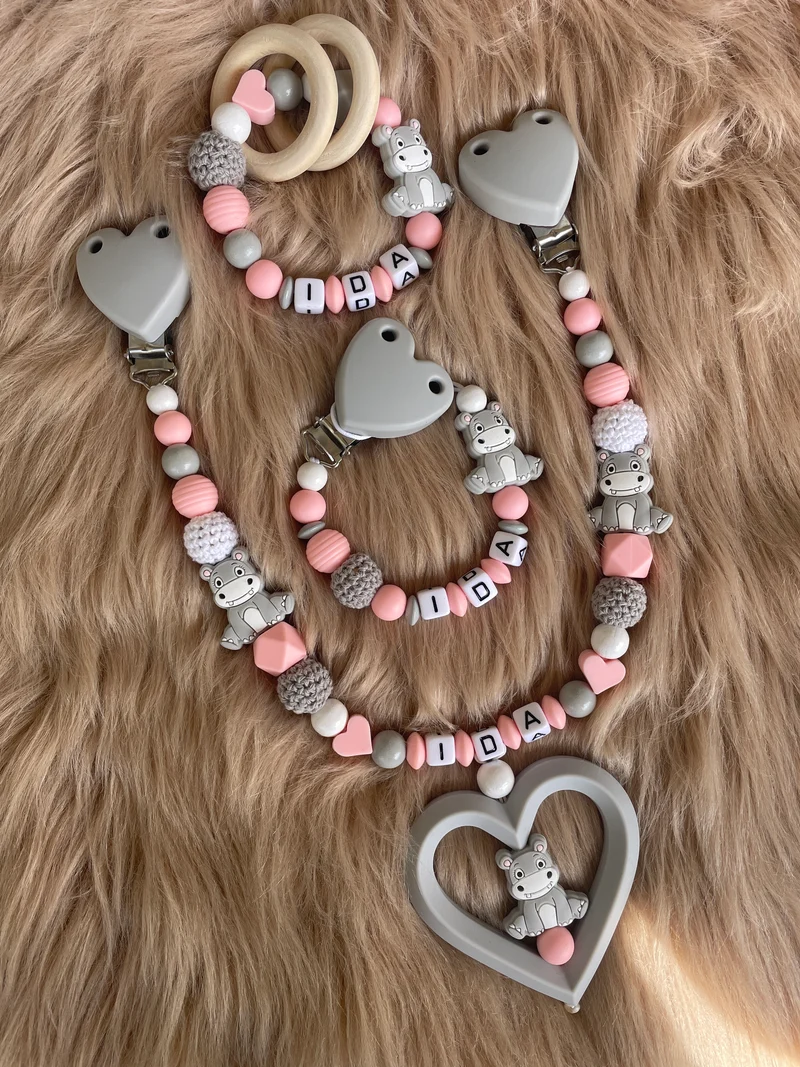 Schnullerkette, Kinderwagenkette, Greifring personalisiert Nilpferd rosa grau