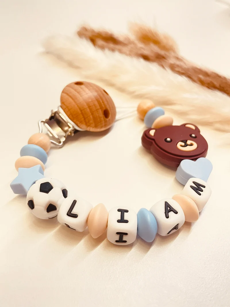 Schnullerkette Bär Fußball blau beige natur