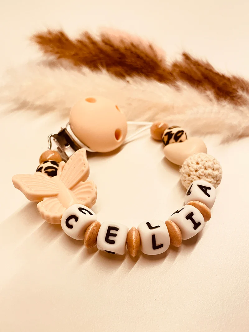 Schnullerkette Schmetterling Herz beige natur leo