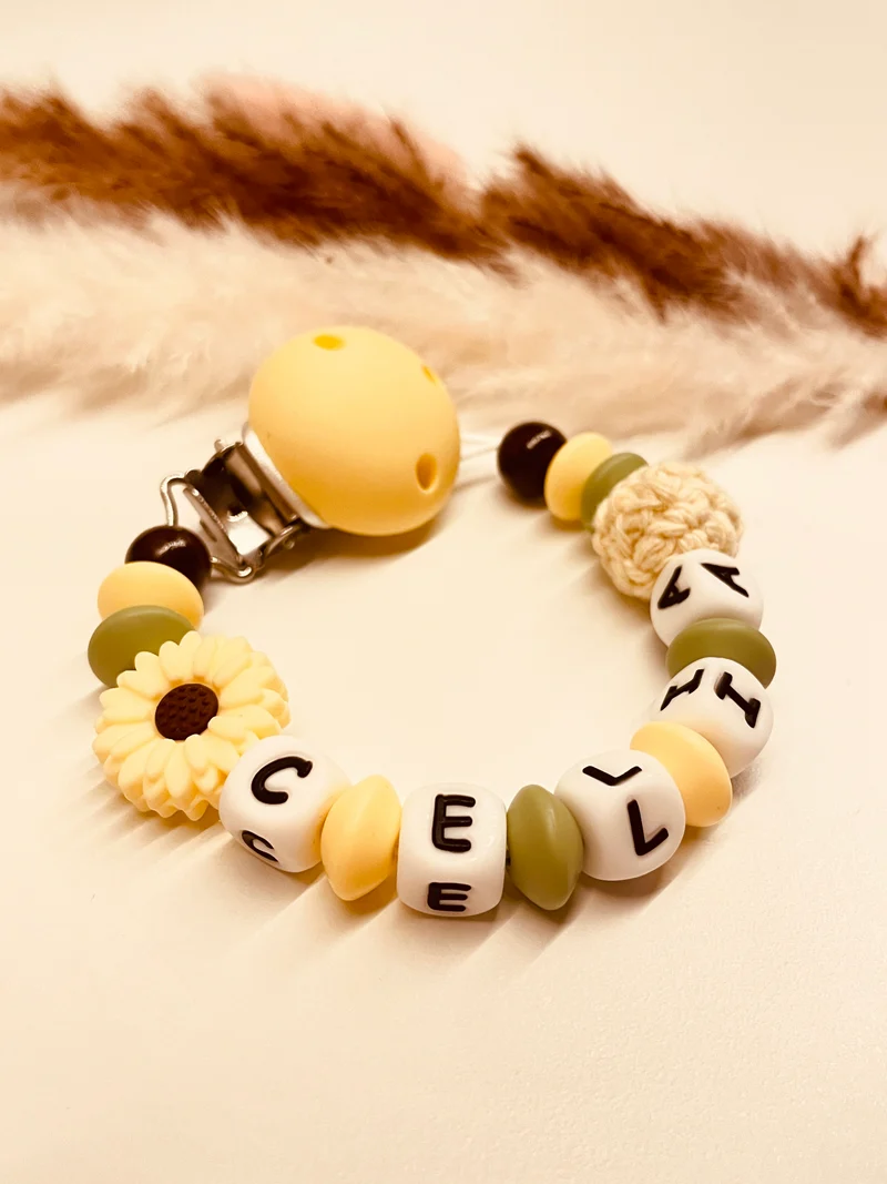 Schnullerkette Blume gelb grün 12,90€, statt 17,90€