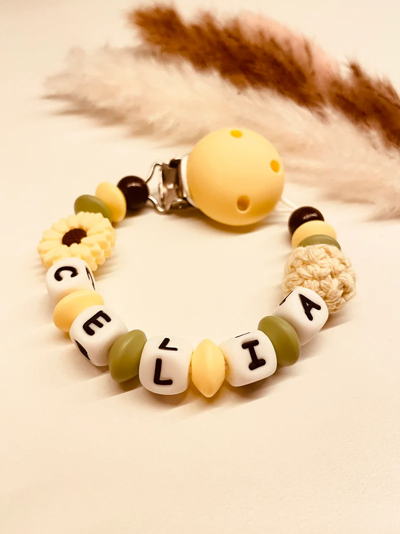 Schnullerkette Blume gelb grün 12,90€, statt 17,90€