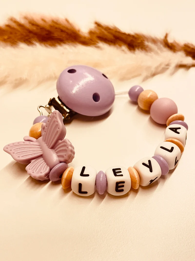 Schnullerkette Schmetterling flieder beige