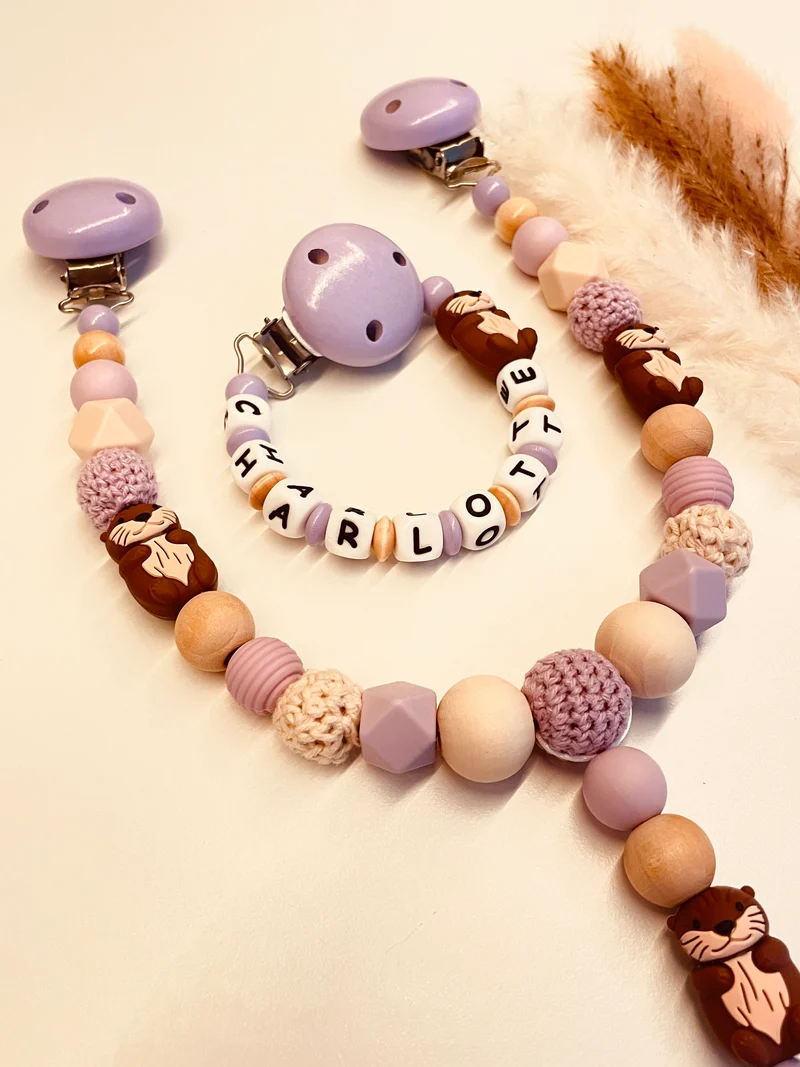 Schnullerkette, Kinderwagenkette personalisiert Otter beige flieder