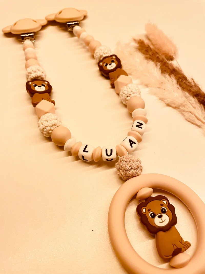 Schnullerkette, Kinderwagenkette personalisiert Löwe beige