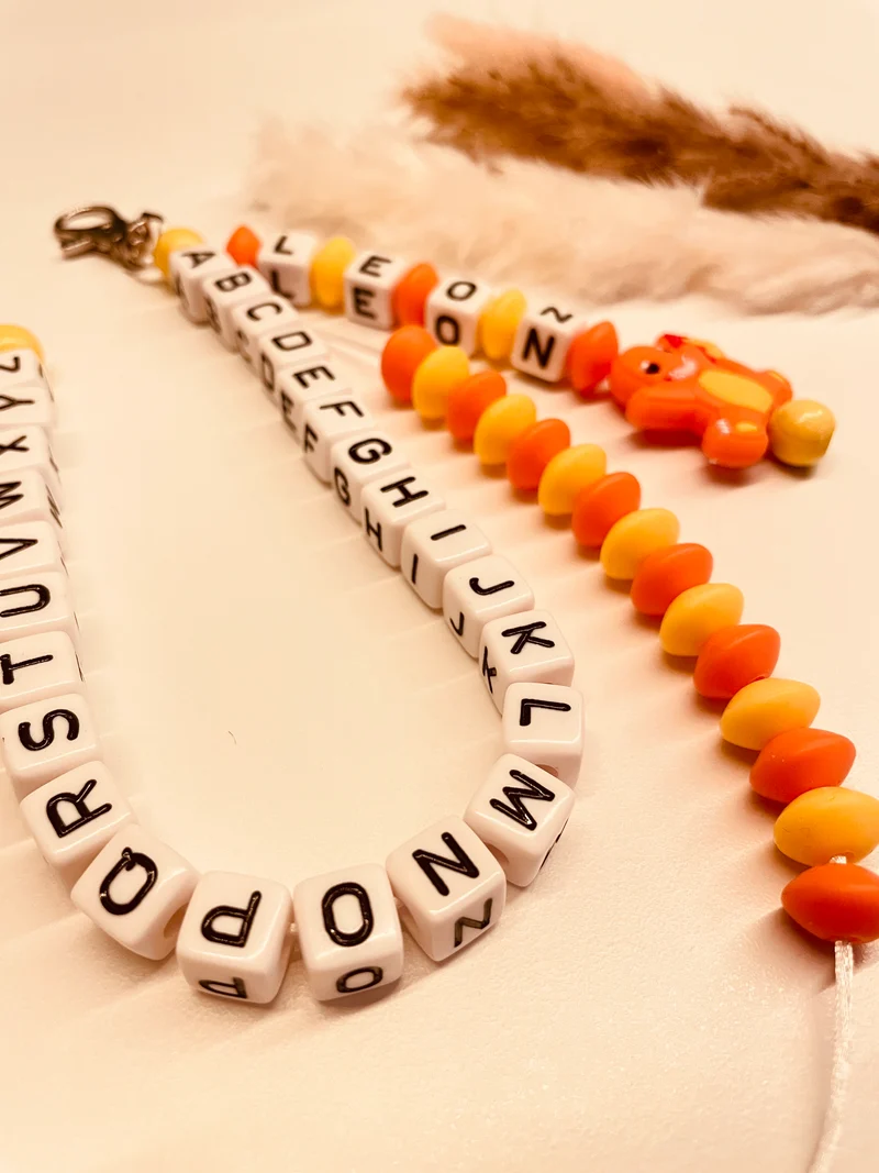 ABC & Rechenkette personalisiert Dinosaurier orange gelb