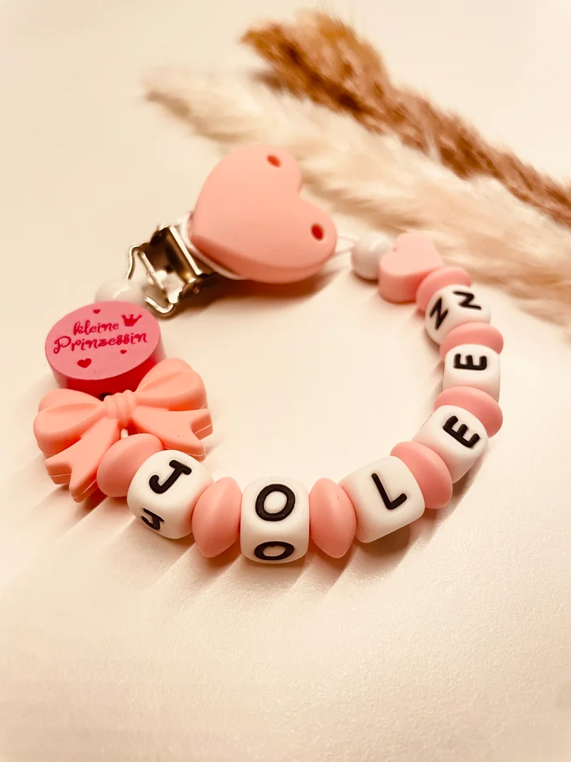 Schnullerkette kleine Prinzessin mit Schleife und Herz rosa pink