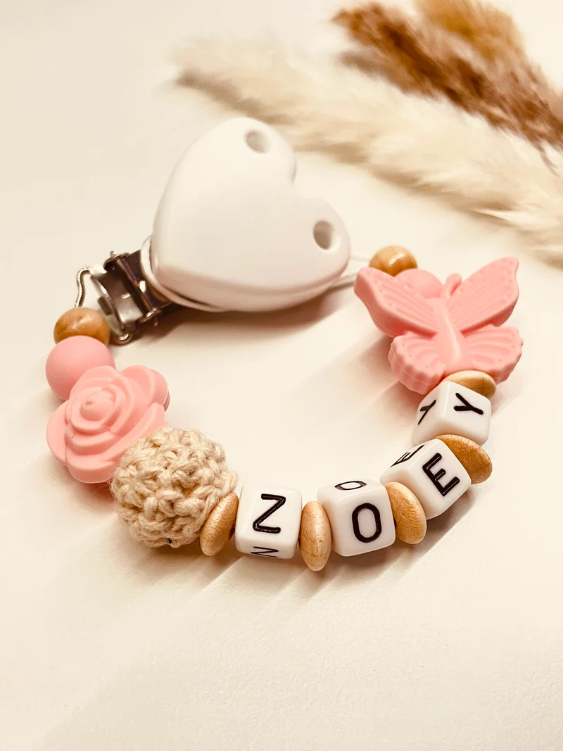 Schnullerkette Schmetterling mit Rose candy rosa-natur