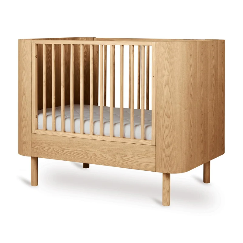 Mitwachsendes Premium Babybett Yume, handgefertigte Rundungen