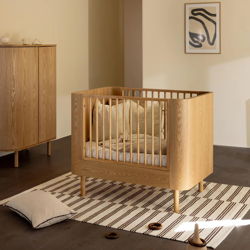 Mitwachsendes Premium Babybett Yume, handgefertigte Rundungen