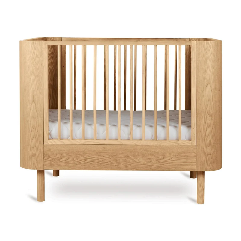 Mitwachsendes Premium Babybett Yume, handgefertigte Rundungen