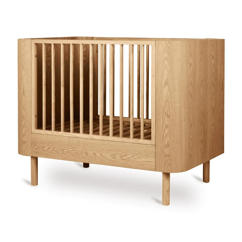 Mitwachsendes Premium Babybett Yume, handgefertigte Rundungen