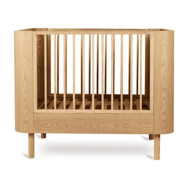 Mitwachsendes Premium Babybett Yume, handgefertigte Rundungen