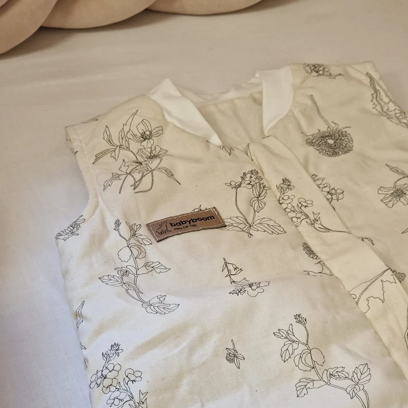 Drehbarer Ganzjahres-Schlafsack | Schlummersack mit umklappbaren Füßen | Bio-Baumwolle | Feldblumen | 80 cm | 1,0 TOG