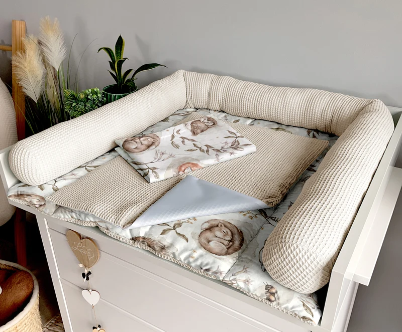 Changing mat | Sleeping animals and light beige