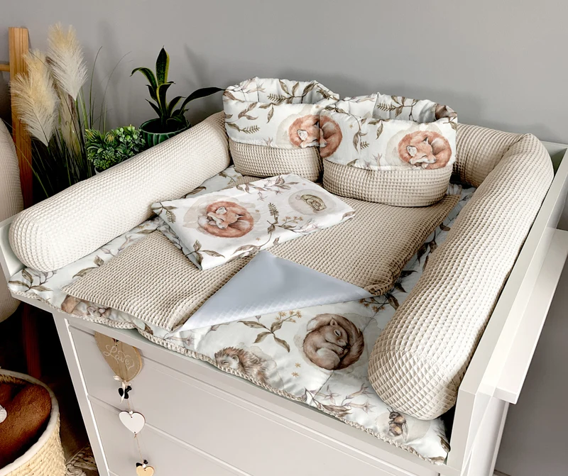 Changing mat | Sleeping animals and light beige