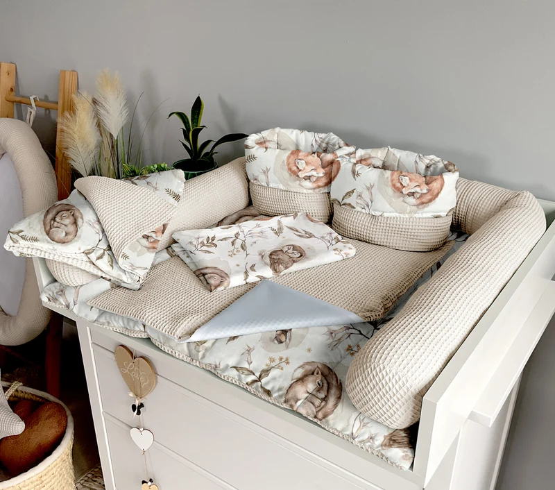Changing mat | Sleeping animals and light beige