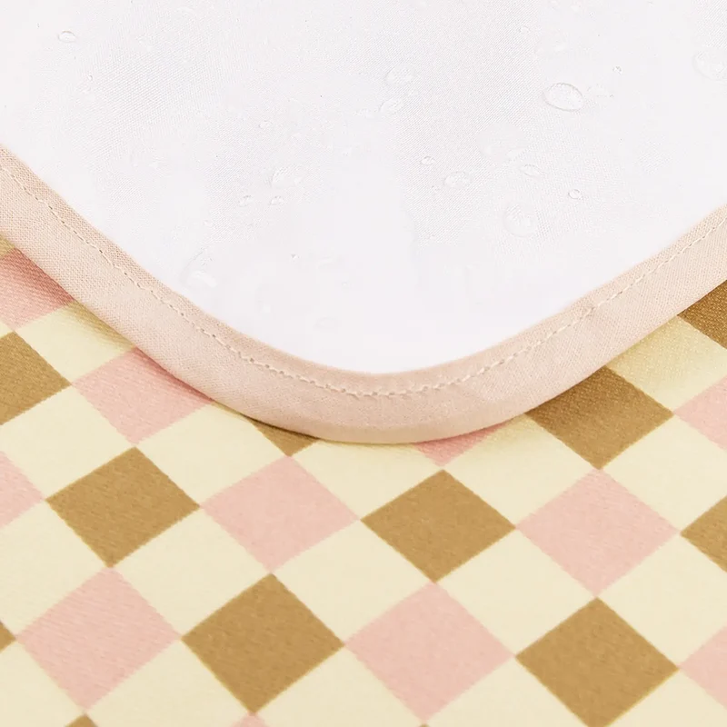 Nobodinoz wasserfeste Wickelunterlage 'Hyde Park' Yellow Pink Mosaic
