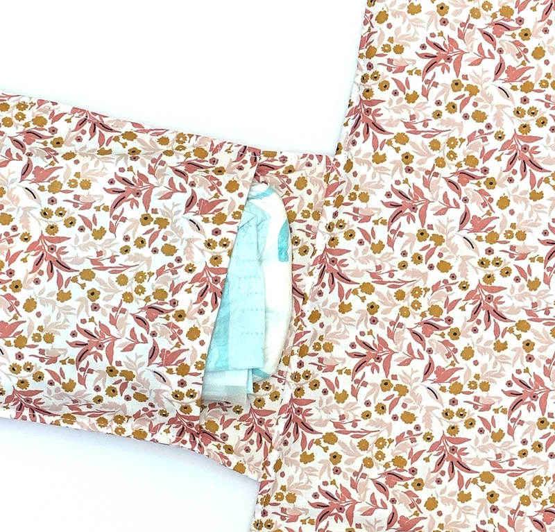 Wickeltasche Windeltasche mit Wickelunterlage für unterwegs ABWASCHBAR Blumenwiese Rosa Beschichtet